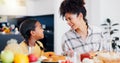 Happy, breakfast and mother eating with kid in dining room at modern home together for bonding. Smile, love and young Royalty Free Stock Photo