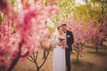 Happy bridal couple in park