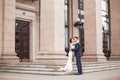 Happy bride and groom celebrating wedding day. Kissing married couple. Long family life concept Royalty Free Stock Photo