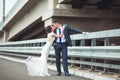 Happy bride and groom celebrating wedding day. Kissing married couple. Long family life concept