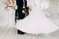 Happy bride and groom dancing indoors at wedding day. Wedding couple in love, newlyweds. Wedding concept Royalty Free Stock Photo