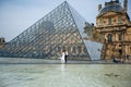 Happy bride and groom enjoying their wedding in Paris