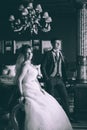 Happy bride and groom in luxury chairs in chic interiors Royalty Free Stock Photo