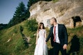 Happy bride and groom in mountain city on their wedding day Royalty Free Stock Photo