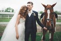 Happy bride and groom posing after wedding ceremony Royalty Free Stock Photo