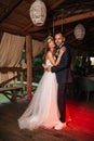 Happy bride and groom and their first dance, wedding in the elegant restaurant with a wonderful light and atmosphere Royalty Free Stock Photo