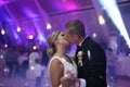 Happy bride and groom and their first dance, wedding in the elegant restaurant with a wonderful light and atmosphere Royalty Free Stock Photo