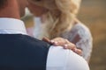 Happy bride and groom on their wedding hugging. Royalty Free Stock Photo