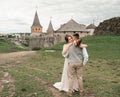 Happy bride and groom on their wedding hugging Royalty Free Stock Photo