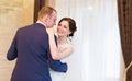 Happy bride and groom on their wedding indoor