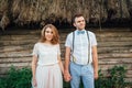 Happy Bride and groom walking on the green grass Royalty Free Stock Photo