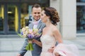 Happy bride and groom walking. Royalty Free Stock Photo