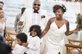 Happy bride and groom in a wedding ceremony at a tropical island Royalty Free Stock Photo