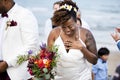 Happy bride and groom in a wedding ceremony at a tropical island Royalty Free Stock Photo