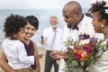 Happy bride and groom in a wedding ceremony at a tropical island Royalty Free Stock Photo