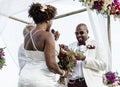 Happy bride and groom in a wedding ceremony at a tropical island Royalty Free Stock Photo