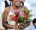 Happy bride and groom in a wedding ceremony at a tropical island Royalty Free Stock Photo