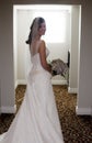 Happy bride in hallway