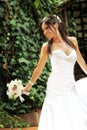 Happy bride holding a bouquet