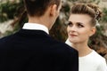 Happy bride looking at her groom at sandy lake, luxury elegant wedding Royalty Free Stock Photo