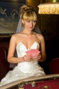 Happy bride playing cards Royalty Free Stock Photo