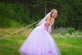 Bride pulls a steel chain Royalty Free Stock Photo