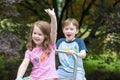 Happy brother and sister playing in park Royalty Free Stock Photo