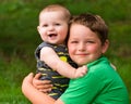 Happy brothers hugging in summer portrait Royalty Free Stock Photo