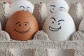 Happy brown and white eggs in box made from recycled paper Royalty Free Stock Photo