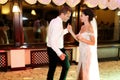 Happy brunette bride in vintage white dress and handsome groom d Royalty Free Stock Photo