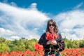 happy brunette lady enjoy freedom in the poppies field Royalty Free Stock Photo