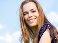 Happy brunette teen girl in outdoor portrait