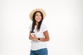 Happy brunette woman in hat holding take away coffee cup Royalty Free Stock Photo