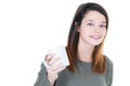 Happy brunette woman holding tea mug coffee and looking at the camera with back copy space Royalty Free Stock Photo