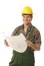 Happy builder holding floor plan