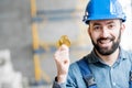 Builder with cryptocoin Royalty Free Stock Photo