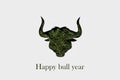 Happy bull year. Christmas tendy card 2021. silhouette of a green bull with a Christmas trees on its body.