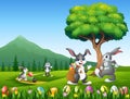 Happy bunnies playing on the nature background