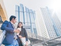 Happy Business colleagues outside office & talking to each other. Royalty Free Stock Photo