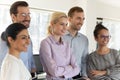 Happy business group of multiethnic employees posing for corporate picture Royalty Free Stock Photo