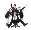 Happy Business group push colleague sitting in chair Royalty Free Stock Photo