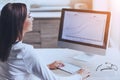 Happy Business Lady Using Computer in Office. Royalty Free Stock Photo