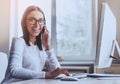 Happy Business Lady Using Computer in Office. Royalty Free Stock Photo