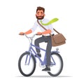 Happy business man rides a bicycle. A cyclist in a business suit rides to work in the office