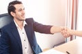 Happy business man shaking hand closing the deal Royalty Free Stock Photo