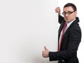 Happy business man showing blank signboard Royalty Free Stock Photo