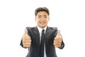 Happy business man showing thumbs up sign