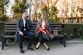 Happy Business Man and Woman Chatting on Bench Royalty Free Stock Photo