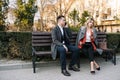 Happy Business Man and Woman Chatting on Bench Royalty Free Stock Photo