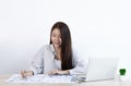 Happy business people,Asian female employee works in the company`s financial auditing with a smiling face